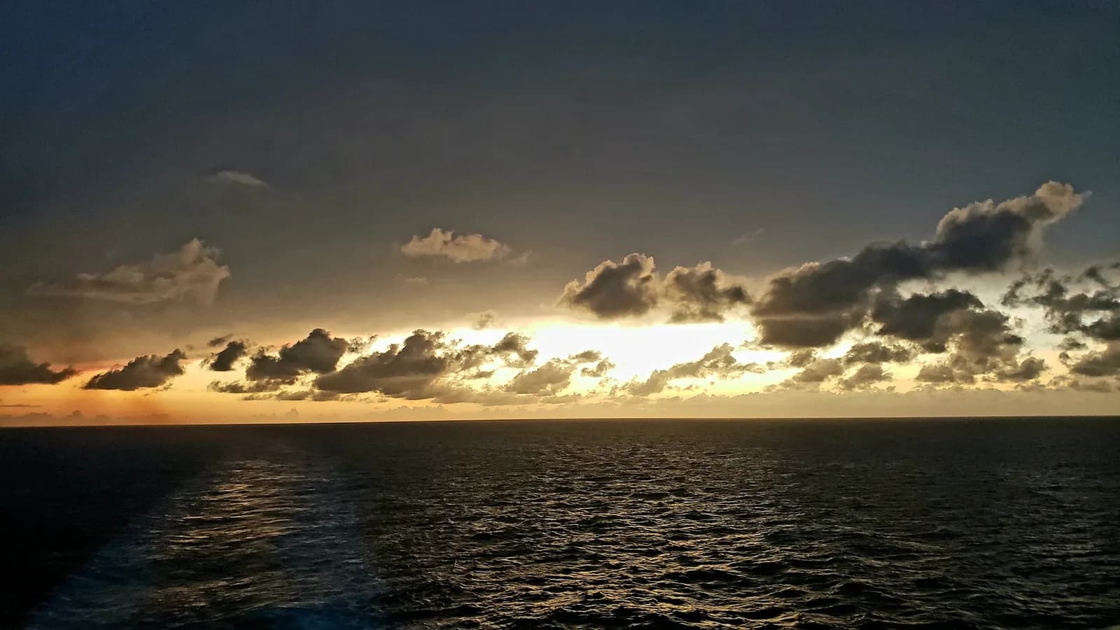 Sunset over the open sea from the deck of Enchantment of the Seas, on my September 2019 cruise out of Galveston